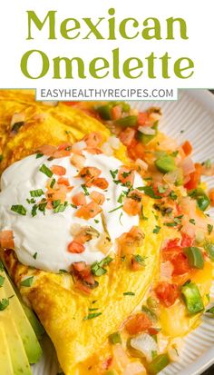 mexican omelette on a plate with avocado and sour cream in the middle