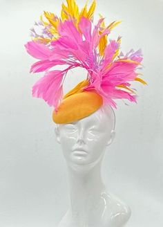 Handmade by Featured Milliner of The Kentucky Derby Museum 2023 & 2024! Pink, yellow gold and light purple feathers on a gold button base. Attaches with headband.  Not taking customs this year--Derby 150 is going to be massive and mom life keeps me running! However, happy to suggest pieces that will coordinate with your outfit. If you don't love the way this attaches to your head--message me!  I can swtich *most* pieces to your preference. Clip, Headband OR Elastic Cord  NOTE: Heavier pieces wit Yellow Fascinator For Formal Royal Ascot, Yellow Mini Hats For Races At Royal Ascot, Yellow Mini Hat For Royal Ascot Races, Head Message, Purple Feathers, Clip Headband, Kentucky Derby Fascinator, Race Day Outfits, Derby Fascinator