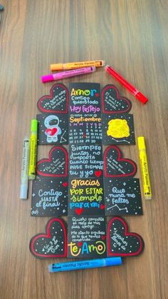 chalkboard with writing on it and markers