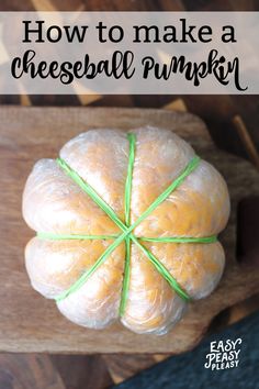 how to make a cheeseball pumpkin on a cutting board with text overlay that reads, how to make a cheeseball pumpkin