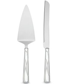 two knives and a knife block on a white background