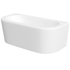 a white bath tub sitting on top of a white floor next to a wall mounted faucet