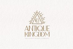 an antique kingdom logo on white paper