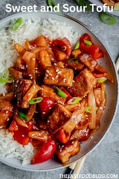 sweet and sour tofu with rice in a white bowl on a gray table top