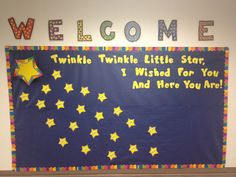 a bulletin board with stars on it and the words twinkle twinkle little star, i wish for you and here you are