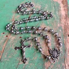 Graceful Glass Rosary with 8mm Clear/Silver Beads, Silver Plated 1" Miraculous Medal Centerpiece and 2" H Crucifix. 22" L Rosary. Adjustable Silver Rosary With Faceted Beads, Miraculous Medal, Oct 11, Prayer Cards, Rosary, Silver Beads, Clear Glass, Silver Plate, Silver Plated