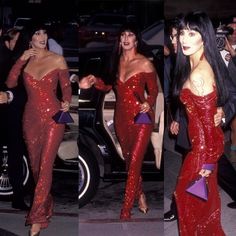 two women dressed in red sequins and one is wearing a purple clutch bag