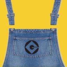 a pair of blue denim overalls with the letter g on it's side