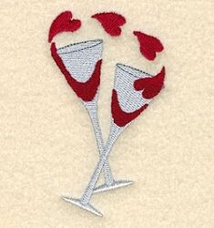 two wine glasses with hearts in them on a white background embroidered onto a piece of cloth