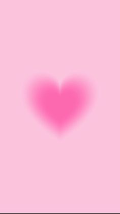 a pink heart on a pink background