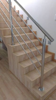 the stairs are made of wood and metal