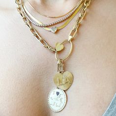 This uniquely handcrafted charm pendant is composed of 14K solid gold and beautifully complemented by a durable 14K solid gold chain, or available to be purchased as a charm alone without the chain. Lock Dimensions: approximately 14mm (w) x 25mm (h) x 1.75mm thick Weight: approximately 3.5 grams Metal Finish: High Shine Polish This design is available in Rose, White and Yellow 14K Gold This item is proudly made in USA and also available in 18K solid gold options upon request. Kindly email info@n Lock Charm Necklace, I Love La, Elongated Oval, I Love Ny, Solid Gold Necklace, Real Turquoise, Diamond Eyes, Solid Gold Chains, Charm Pendant Necklace