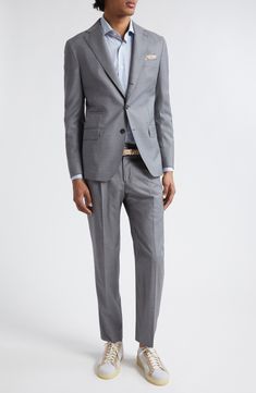 This Italian-crafted suit done in a single-breasted silhouette is tailored from wool and fashioned with notched lapels for a comfortable, polished look. Jacket has three-button closure; notched lapels; chest welt pocket; welt ticket pocket; front flap pockets Trousers have zip fly with button closure; front slant pockets; back welt pockets Partially lined 100% wool Dry clean Made in Italy Designer Clothing Professional Single Breasted Three-piece Suit For Semi-formal Occasions, Three-piece Suit With Notch Lapel For Semi-formal Events, Slim Fit Single Breasted Three-piece Business Suit, Professional Three-piece Suit With Single-breasted Design, Three-piece Suit With Suit Collar For Office, Office Wear Single-breasted Three-piece Suit, Office Wear Three-piece Single Breasted Suit, Professional Three-piece Single Breasted Suit, Slim Fit Three-piece Suit With Notch Lapel