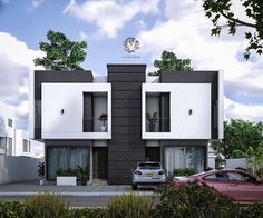 two cars are parked in front of a modern house with black and white exteriors