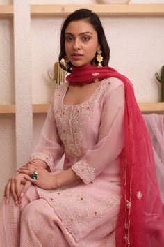 Pink kurta with bead, floral embroidery. Paired with sharara and dupatta.
Component: 3
Pattern: Embroidery
Type Of Work: Bead, floral
Neckline: Round
Sleeve Type: Three quarter
Fabric: Organza, tissue
Color: Pink
Other Details: 
Scallop bordered sheer dupatta
Occasion: Mehendi and Haldi - Aza Fashions Reception Salwar Kameez With Dori Work, Straight Kurta, Embroidered Sharara For Reception With Straight Kurta, Embroidered Sharara With Straight Kurta For Reception, Semi-stitched Chikankari Embroidery Sets For Reception, Embroidered Sharara For Reception, Chanderi Sharara For Reception During Eid, Embroidered Organza Palazzo Set For Reception, Organza Palazzo Set With Chikankari Embroidery For Receptions, Resham Embroidery Sharara For Reception