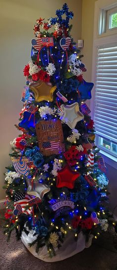 a decorated christmas tree with patriotic decorations