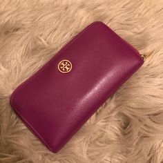 Tory Burch Zip Around Wallet. Pink/Purple With Red Inside, Gold Hardware. Holds 12 Cards And Has A Bunch Of Compartments To Hold Cash, Coins Etc. Elegant Purple Wallets For Travel, Elegant Purple Bifold Wallet, Elegant Purple Wallet For Gift, Tory Burch Bags, Tory Burch Bag, Pink Red, Gold Hardware, Pink Purple, Zip Around Wallet