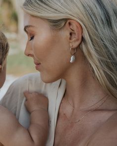 Elegant Organic shape Pearl drop hoop earring featuring freshwater pearl Perfect bridesmaids gift or for bridal jewelry * Available in 14k gold filled or sterling silver * Stud Style post and backing * vary in shape and size. * 1 Pair * Hoop Sizes Small: 15mm Medium :20mm -Perfect gift for Bridesmaids, Bride --------------------------------------- ■ SHIPPING UPGRADES You can find shipping upgrades options in the drop bar menu when you check out. * Within the U.S Regular First-class : 2-6 busines Big Pearl Earrings, Bridal Jewelry Gold, Hoop Earrings Big, Earrings Big, Big Pearl, Stud Style, Bar Menu, Pearl Hoop Earrings, Earrings Pearl