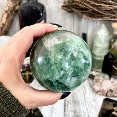 Add a burst of color and clarity to your home or collection with our Fluorite Crystal Ball. This vibrant piece is perfect for enhancing any space with its natural beauty and positive energy. Known for its ability to cleanse and stabilize the aura, fluorite promotes mental clarity and focus. Ideal for meditation, energy work, or as a striking decor item, this crystal ball is a must-have for crystal enthusiasts and collectors. Natural Fluorite: High-quality, ethically sourced. Healing Properties: Green Crystals For Healing, Green Spiritual Healing Crystals, Pisces Jewelry, Crystal Spiritual, Green Fluorite Crystal, Sphere Crystal, Green Fluorite, Sagittarius And Capricorn, Capricorn And Aquarius