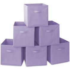 purple storage bins stacked on top of each other