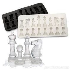 an ice tray with chess pieces on it