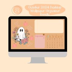 a desktop computer screen with a calendar on it and a ghost sticker next to the monitor