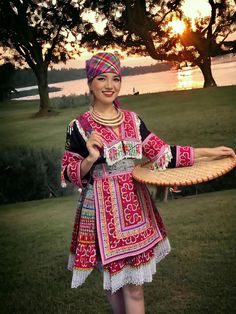 This dress is expertly crafted with precise attention to detail, featuring the vibrant colors, intricate hand embroidery, and unique patterns typical of Hmong textiles. Made from high-quality materials, he handmade dress not only highlights the elegance of Hmong culture but also provides lasting comfort and durability. It's perfect for wearing to special events, cultural celebrations, or as a standout piece in your everyday wardrobe. The whole outfit includes a shirt, skirt, apron and belt. The Tribe Fashion, Hmong Fashion, Hmong Clothes, Hmong Textiles, Cultural Celebration, Handmade Dresses, Everyday Wardrobe, Dress Clothes For Women, Hand Embroidered