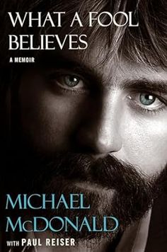 the cover of what a fool believes by michael mcdonald and paul reiser, with an image of a bearded man's face