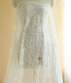 Beautiful Off-white tulle embroidery lace fabric with delicate clear sequins, used for a lot of haute couture dresses , wedding gowns, bridal dress . Width is about 130 cm / 51 '', price is for one yard , more buying will be cut as one piece . Gorgeous choice for wedding gown, bridal lace fabric, haute couture . Back to shop DIRECTORY https://www.etsy.com/shop/Retrolace?ref=si_shop Delicate Wedding Dress, Wedding Dress Sash Belt, Embroidered Wedding Gown, Wedding Dress Sash, Bridal Lace Fabric, Bridal Fabric, Embroidered Tulle, Wedding Dress Accessories, Embroidered Wedding