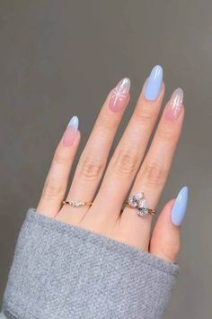 60+ Classy Winter Nails & Winter Nail Trends Explained Basic Nails Blue, Simple Blue Winter Nails, Simple Winter Nails 2024, Round Winter Nails, Baby Blue Winter Nails, Holiday Nails Blue, December Nails Blue, Ice Blue Nails Winter, Light Blue Winter Nails