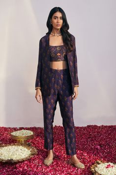 Purple front-open jacket with multi-color printed motifs and hand embroidered hem. Comes with crop top and straight pants.
Component: 3
Printed, Embroidered
Sleeve Length: Jacket: Full
Fabric: Dupion Silk
Color: Purple
Front open
 - Aza Fashions Purple Pantsuit, Stand Collar Top, Set Saree, Printed Jacket, Purple Pants, Shirt Pant Set, Dupion Silk, Top And Pants Set, Sharara Set