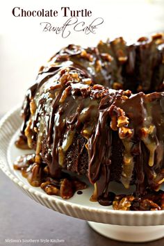 chocolate turtle bundt cake on a white plate