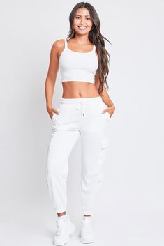 Keep it cute and casual in our Women’s Joggers with Nylon Pockets. These trendy mixed-media joggers are constructed with a soft, midweight polyester fabric and feature pleated flap cargo pockets made of parachute-style material. These lounge pants feature an elastic waist with drawstring closure, inseam front pockets, and an elastic hem. Style with a fitted tank and sneakers for an on-trend sporty vibe. Product Details- High-Rise- Elastic Waist with Drawstring Closure- Inseam Front Pockets- Doub Ymi Jeans, Women Lifestyle, Elastic Waist Shorts, Joggers Womens, Mom Shorts, Hem Style, Olive Color, Lounge Pants, Resort Wear