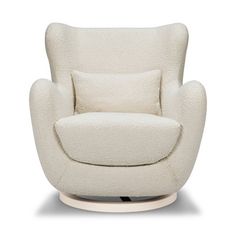 a white chair with a pillow on it's back and the seat upholstered