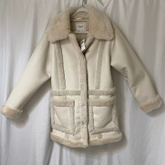 Never Worn! Tag Still On! Bought For $200 Selling For $100! It Came With A Slight Defect In The Leather, But It’s Nothing Noticeable. It’s A Tiny Black Speck. (Photo Available) White Faux Fur Trim Outerwear For Fall, White Outerwear With Faux Fur Trim For Fall, White Long Coat With Pockets, Cream Long Sleeve Outerwear With Faux Fur Trim, Cream Long Coat With Faux Fur Trim, White Faux Fur Trim Outerwear For Work, White Outerwear With Faux Fur Lining For Work, Cream Outerwear With Faux Fur Lining For Spring, Cream Outerwear With Faux Fur Lining For Work