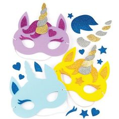 three masks with unicorns and stars on them