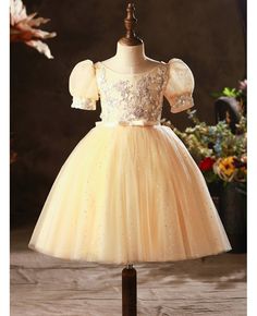 Buy yellow sequined ballgown tulle little girls party dress with bubble sleeves at wholesale price online. Free shipping and pro custom service since 2009. Short Sleeve Tulle Princess Dress For Party, Princess Ball Gown Dress With Sequins, Yellow Tulle Tutu Dress For Pageant, Yellow Princess Dress For Pageant, Princess Tulle Ball Gown For Party Season, Tulle Princess Dress For Prom, Princess Style Tulle Ball Gown For Party Season, Prom Season Tulle Princess Dress, Yellow Tulle Princess Dress