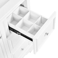 an open drawer is shown on the side of a white cabinet with drawers in it