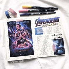 the avengers endgame book with markers and pencils next to it on a sheet of paper