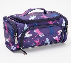 a purple flowered bag with zippers on the front and side, sitting on a white surface