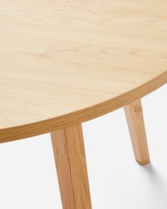 a close up of a wooden table with no one on it's legs or feet