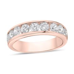 a rose gold wedding ring with five stones on the side and two rows of diamonds set in