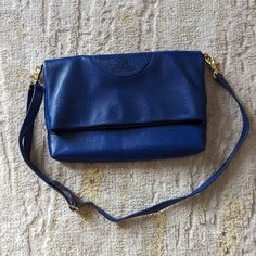 Excellent Condition Gorgeous Convertible With An Adjustable Strap Smoke Free Home New To Poshmark? Use Code Ineedoptions To Save $10 On Your First Order. Tory Burch Crossbody, Tory Burch Bags, Tory Burch Bag, First Order, Blue Gold, Crossbody Bags, Convertible, Tory Burch, Adjustable Straps