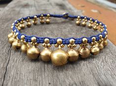 This anklet or bracelet made with brass bells and brass beads woven together with navy blue waxed cord and brass bell for closure. It's jingling sound when you move!! *Size: Choose your size or colors of cord from the drop-down menu. If you need silver instead of brass, just take note to me in the message to seller. *✈️ Shipping.. The item shipped by registered airmail Thailand Post within 3-5 working days after payment received. - United States and Europe: It's will take about 2-4 weeks to deli Adjustable Festival Jewelry With Bells, Adjustable Bells Jewelry For Festivals, Waist Jewelry, Wax Cord Bracelet, Beautiful Anklet, Cord Jewelry, Silver Bells, Brass Bells, Chain Anklet