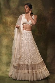 Ivory net lehenga with an attached cancan and pearls and resham thread embroidery. Comes with a padded blouse and a dupatta. - Aza Fashions White Organza Lehenga With Lace Work, Traditional Net Lehenga With Lace Work, Lace Choli With Sheer Dupatta For Reception, White Lehenga With Traditional Drape In Net Material, White Lehenga With Traditional Drape, Traditional White Net Lehenga, Traditional Drape White Net Lehenga, Lace Work Sharara For Wedding And Navratri, Wedding Sharara With Lace Work For Navratri