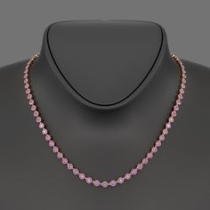 Indulge in luxury with our 9.56 Carat Natural Pink Sapphire & Amethyst Custom Choker Necklace in 14K Gold. Featuring a personalized Art Deco design, this exquisite necklace combines vibrant pink sapphires and amethysts in a unique and elegant arrangement. Perfect as a one-of-a-kind jewelry gift, it exudes timeless sophistication and a bespoke touch, crafted to celebrate special moments with unmatched beauty. 𝐅𝐞𝐚𝐭𝐮𝐫𝐞𝐬:• 𝐌𝐚𝐝𝐞 𝐭𝐨 𝐎𝐫𝐝𝐞𝐫• 𝐌𝐞𝐭𝐚𝐥: 𝟏𝟎𝐊 𝐆𝐨𝐥𝐝 | 𝟏𝟒𝐊 𝐆𝐨𝐥 Luxury Sapphire Birthstone Necklace, Round Shape, Luxury Sapphire Birthstone Necklace In Elegant Style, Luxury Round Cut Birthstone Necklace Gift, Luxury Diamond Cut Round Birthstone Necklace, Luxury Round Diamond Cut Birthstone Necklace, Luxury Elegant Pink Tennis Necklace, Luxury Sapphire Round Birthstone Necklace, Luxury Round Sapphire Birthstone Necklace, Stacked Wedding Rings