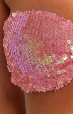 Pink Sequin Bralette Crop

Obsessed is an understatement when it comes to this strapless sequin bralette. A perfect fit if you're wanting to be bold and stand out at your next festival! Coordinate with the Nyra Pink Sequin Bottoms and boots. Grab your sunnies and have the time of your life girl!

Pink sequin fabric 
Fully lined 
Mid weight material with stretch
Bralette style
Super cropped length
Hook and eye fastening at rear
Ribbon detail at centre bust
Grip at top of strapless bust Custom Wardrobe, Light Pink Crop Top, Mermaid Board, Coquette Clothing, Obx Dr, Festival Fits, Prom Midi Dress, Strapless Bralette, Summer Playsuit