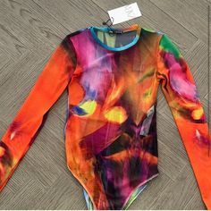 Nwt Zara Multicolored Bodysuit Casual Printed Multicolor Bodysuit, Casual Multicolor Printed Bodysuit, Multicolor Long Sleeve Bodysuit For Summer, Trendy Stretch Multicolor Bodysuit, Trendy Multicolor Printed Bodysuit, Spring Multicolor Stretch Bodysuit, Summer Stretch Color Block Bodysuit, Multicolor Stretch Printed Jumpsuits And Rompers, Multicolor Printed Stretch Jumpsuits And Rompers