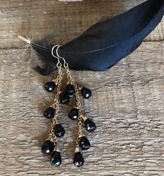 Gold filled dangle earrings wire wrapped with black onyx gemstones Gift Black Beaded Dangle Jewelry, Elegant Black Bead Drop Earrings, Elegant Teardrop Black Bead Jewelry, Gift Black Dangle Beads Jewelry, Elegant Teardrop Black Beaded Jewelry, Elegant Black Long Drop Chandelier Earrings, Black Dangle Earrings With Ear Wire, Nickel Free Black Long Drop Earrings, Black Dangle Linear Earrings