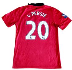 a red soccer jersey with the number 20 on it, which reads v persie